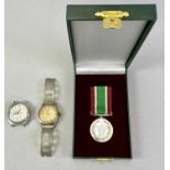 WOMAN'S VOLUNTARY SERVICE MEDAL - 'Service Beyond Self' in presentation case with two ribbons, a