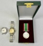 WOMAN'S VOLUNTARY SERVICE MEDAL - 'Service Beyond Self' in presentation case with two ribbons, a