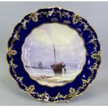 ROYAL CROWN DERBY PORCELAIN PLATE - the crimped cobalt border with raised gilded decoration, painted