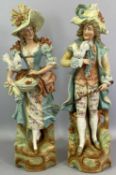 CONTINENTAL BISQUE FIGURINES – late 19th century, a large and decorative pair, gentleman and lady in