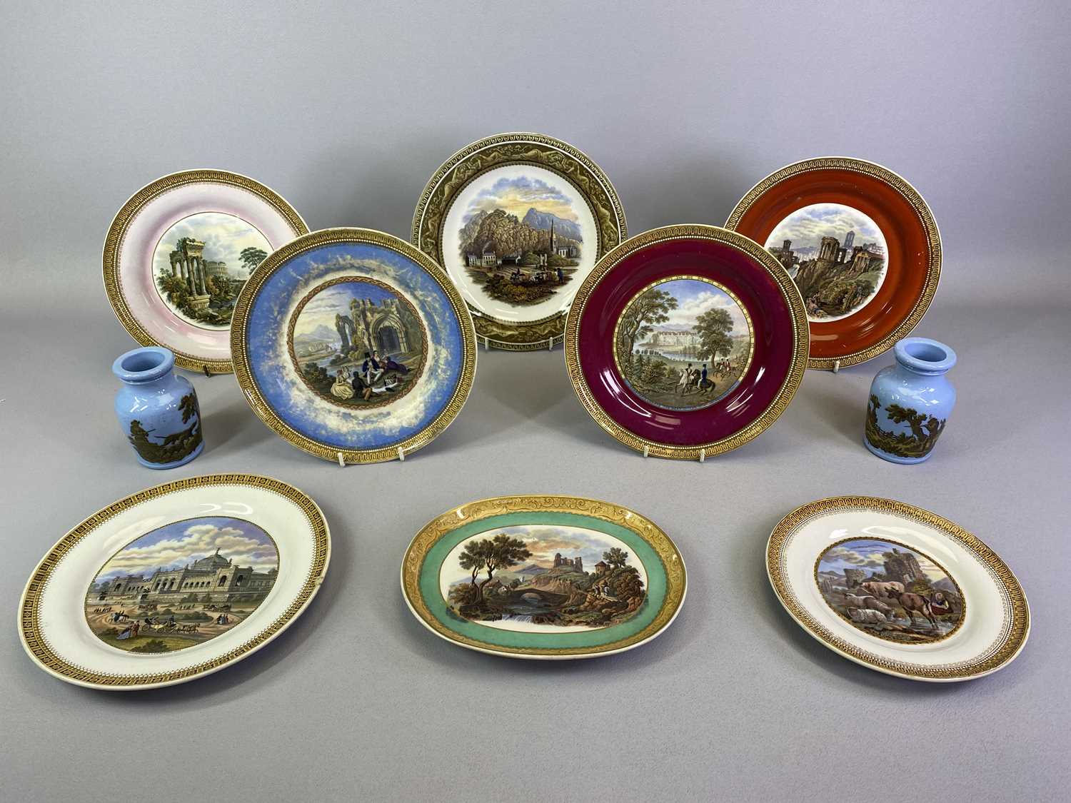 PRATTWARE PLATES - 19th century, a collection of 8 decorated with various scenes including Tremadoc,