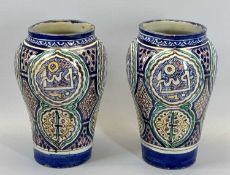 LARGE POTTERY VASES, A PAIR - probably Moroccan, of baluster form and decorated in Persian style,