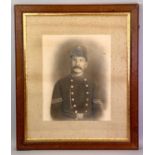 VICTORIAN PHOTOGRAPH - a Policeman in a timber frame, 65 x 55cms overall