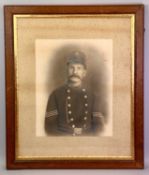 VICTORIAN PHOTOGRAPH - a Policeman in a timber frame, 65 x 55cms overall