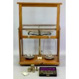 PHILIP HARRIS LTD BIRMINGHAM CHEMIST'S SCALES in glazed mahogany case on adjustable gilded brass
