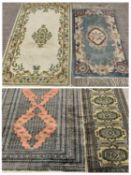 FOUR MIXED EASTERN/ORIENTAL RUGS - to include two Persian style pattern examples, one being multiple