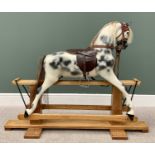 20th CENTURY DAPPLE GREY PEDESTAL ROCKING HORSE - labelled "Haddon Rockers, Makers & Restorers,