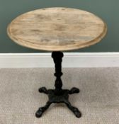 CIRCULAR TOP PUB TABLE - on a four footed cast iron base, 74cms H, 69cms diameter