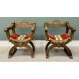 PAIR OF 20th CENTURY "X" FRAMED ARMCHAIRS - with shieldback carved detail and tasselled fabric