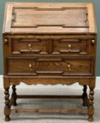 VINTAGE JACOBEAN STYLE OAK FALL FRONT BUREAU - having a fitted interior over two long drawers, on