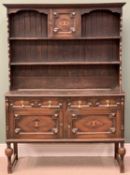 EARLY 20th CENTURY OAK DRESSER - Jacobean style with two shelf rack with top central cupboard over a