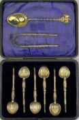 COLLECTOR'S SPOONS & SUGAR TONGS GROUP - to include a cased set of six silver gilt anointing type