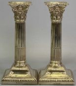 SILVER CORINTHIAN COLUMN CANDLESTICKS, A PAIR - London 1906, Maker Thomas Bradbury & Sons Ltd, 19cms