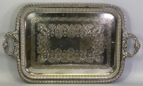 VICTORIAN SILVER PLATED TWO-HANDLED SERVING TRAY - having cast acanthus leaf handles, leaf outer