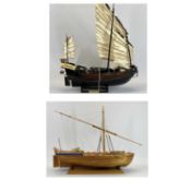 SCALE MODEL SAILING BOAT - of wooden construction with cannons on board, with stand, 51cms H,