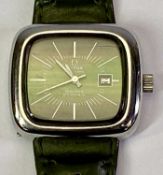 LADY'S OMEGA GENEVE DYNAMIC AUTOMATIC WRISTWATCH - calendar day window to a green dial set with