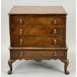 QUEEN ANNE STYLE WALNUT APPRENTICE CHEST ON STAND - rectangular top with molded rim over three