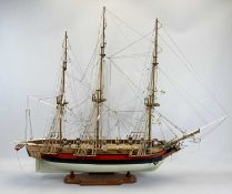 SCALE MODEL THREE MASTED SAILING SHIP - of wooden construction, the hull painted red, black and