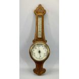 EDWARDIAN OAK ANEROID WALL BAROMETER WITH THERMOMETER - scroll carved decoration, 85cms H