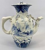 JAPANESE PORCELAIN BLUE & WHITE TEAPOT - moulded decoration and painted with a continuous