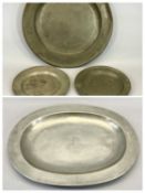 CIRCULAR PEWTER CHARGER, TWO PLATES & AN OVAL MEAT PLATTER - 18th century, London touch marks to the