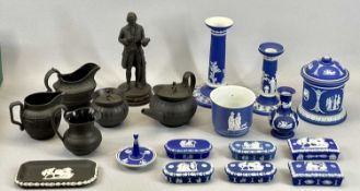 WEDGWOOD JASPERWARE - a collection to include two candlesticks, tobacco jar and six lidded trinket