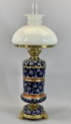 VICTORIAN TAYLOR & TUNNICLIFFE BLUE & WHITE FLORAL CERAMIC OIL LAMP - with gilded metal mounts,