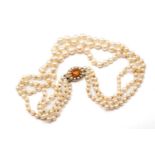 CULTURED PEARL TRIPLE STRAND CHOKER, of grad. pearls 8-4mm to a 9ct pearl & oval cairngorm set