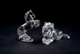 SWAROVSKI CRYSTAL ANIMAL MODELS, comprising rearing stallion, 11cms high, boxed, and recumbent lion,