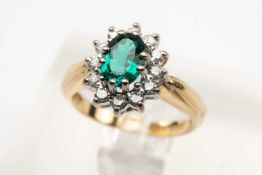 GREEN AND DIAMOND CHIP RING, to a yellow gold shank hallmarked and stamped '750', approx. gross