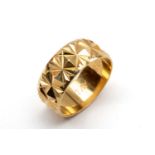 18CT GOLD RING, faceted lozenge relief decoration, ring size O, 5.7gms Provenance: private