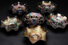 SIX IRIDESCENT CARNIVAL GLASS BOWLS, comprising Fenton round Holly bowl in blue, Fenton