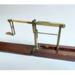 STEPHEN HOUGHTON & SON GUINEA SCALE, folding brass with slide, in mahogany case with instruction