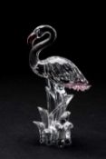 SWAROVSKI CRYSTAL MODEL OF A FLAMINGO, with pink, black and yellow glass detail, boxed with