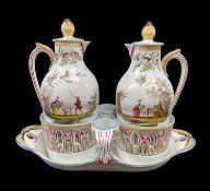 FRENCH FAIENCE CRUET SET, 19th century, in the mid-18th century style, spurious blue 'Veuve