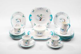 GROSVENOR CHINA 'YE OLDE ENGLISH' PATTERN TEASET FOR TWELVE, decorated with birds, to include cups