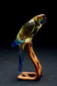 SWAROVSKI CRYSTAL GREEN ROSELLA JONQUIL PARAKEET, on carved wood perch with coloured glass and metal