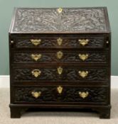 OAK BUREAU - late 19th Century, heavily carved detail of thistles to the forefront over four long