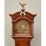 GOOD SLENDER MAHOGANY LONGCASE GRANDMOTHER CLOCK - the hood with arched broken pediment and brass