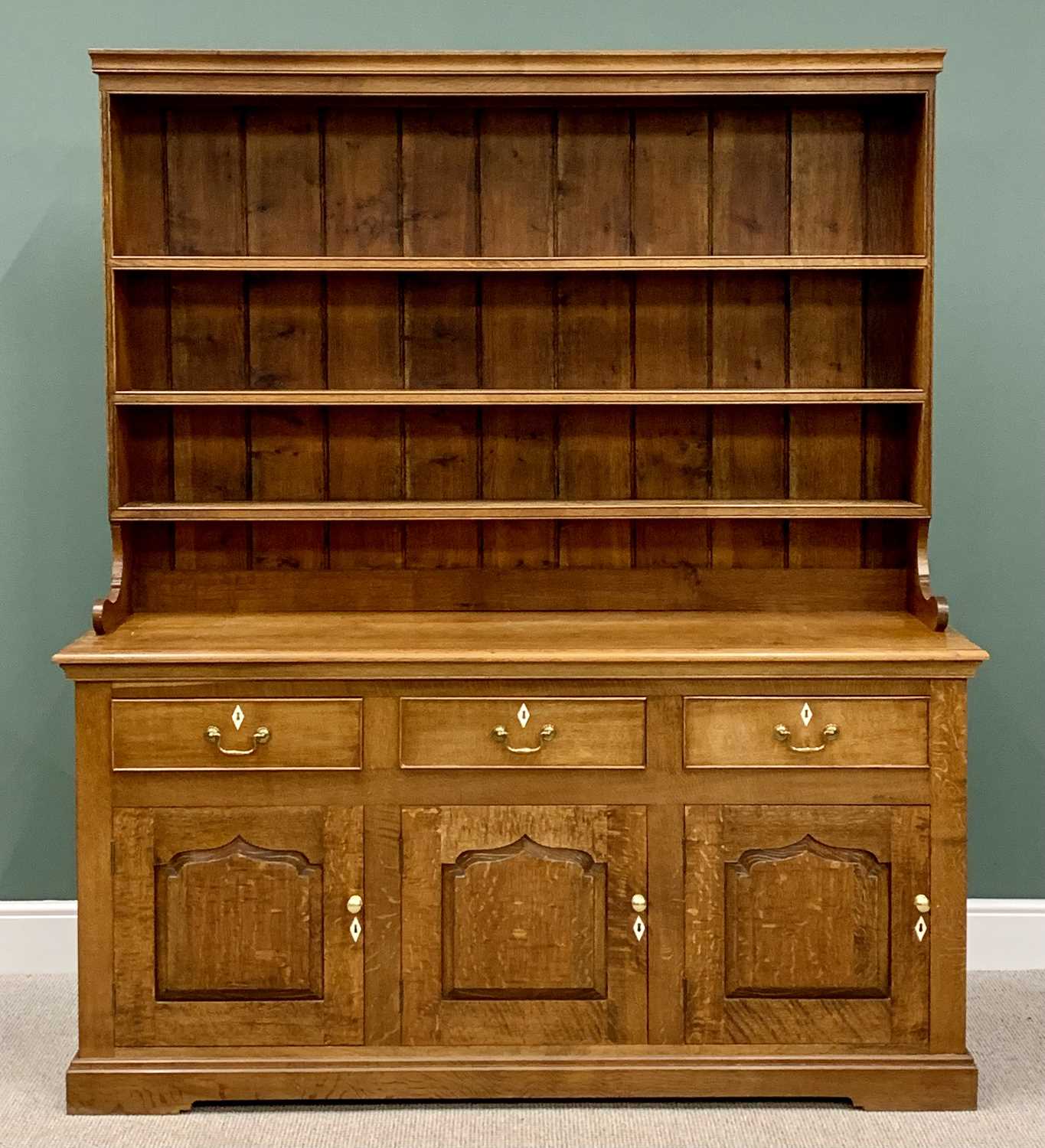 OAK WELSH DRESSER - 20th Century, the boarded plate rack back with three shelves, the base having