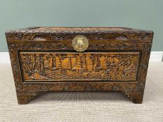 CHINESE CAMPHORWOOD CHEST - heavily carved with panels of boats and buildings, 58cms H, 95cms W,