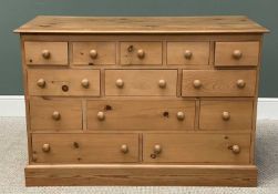 MODERN PINE MULTI-DRAWER CHEST - having thirteen various sized drawers with turned wooden knobs,