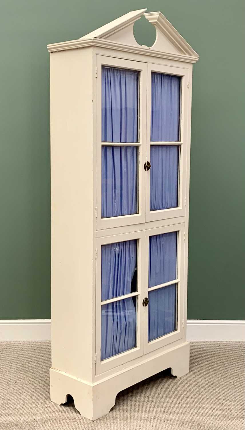 TALL PAINTED CUPBOARD - with broken architectural pediment over four fabric backed glazed doors, - Image 2 of 4