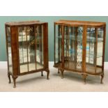 CHINA CABINETS (2) - mid Century, the first having a decorated glass door, shelf lined interior with