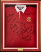 A FRAMED LLANELLI RFC REPLICA SIGNED JERSEY in the 1970s style, signed by approximately 25 x