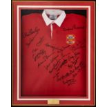 A FRAMED LLANELLI RFC REPLICA SIGNED JERSEY in the 1970s style, signed by approximately 25 x