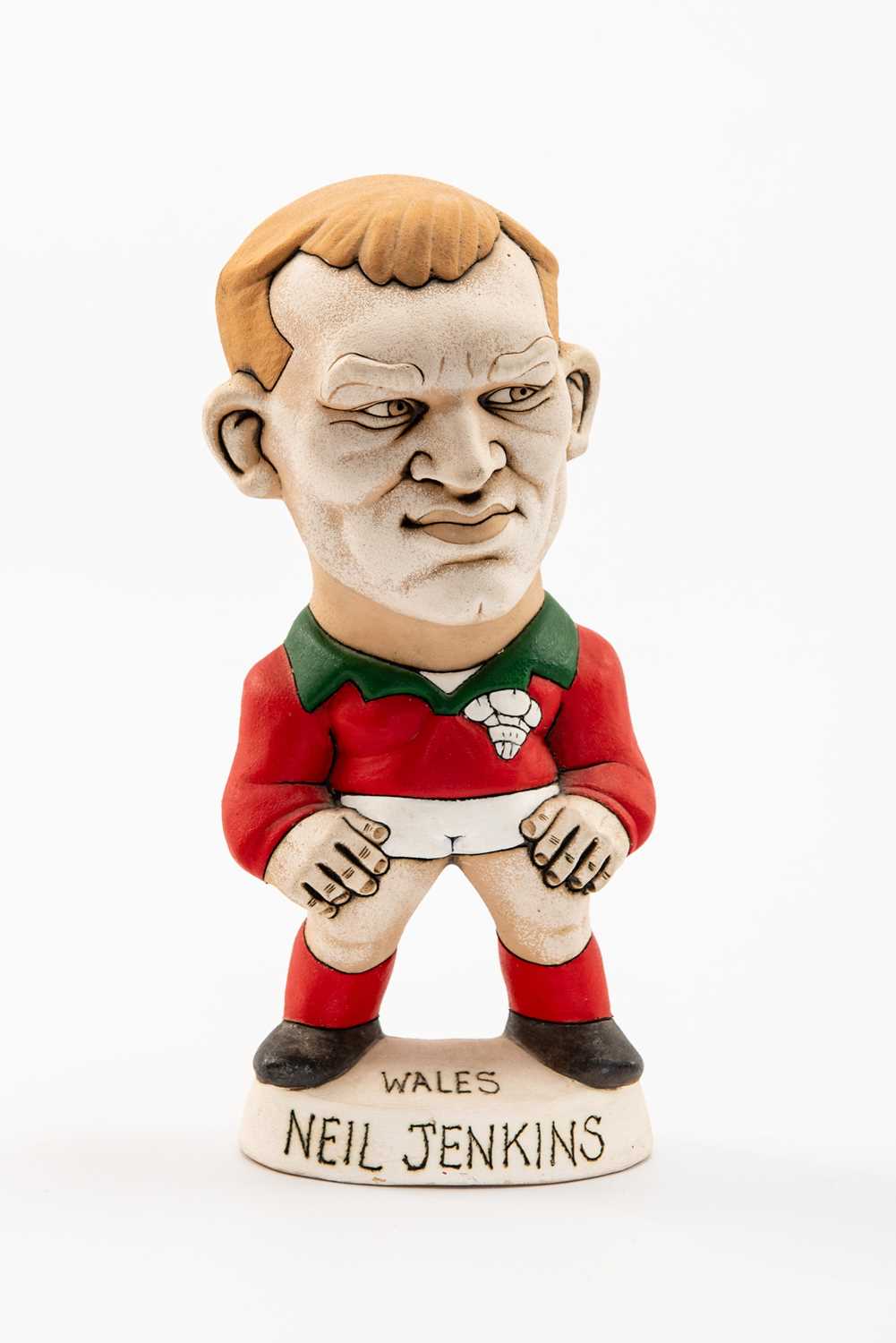 GROGG CARICATURE OF NEIL JENKINS (Grogg Shop Wales) standing on titled base, wearing his Wales No.10