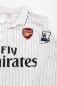 RARE 2009-10 CHAMPIONS LEAGUE MATCH ISSUED 3RD ARSENAL SHIRT, with long sleeves, white with burgundy