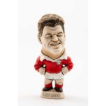 GROGG CARICATURE BY JOHN HUGHES (GROGG SHOP WALES) OF SCOTT GIBBS standing on titled base, wearing