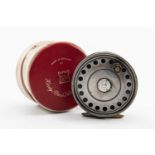 HARDY 'ST JOHN' 3 7/8" FLY REEL, with single black handle, brass tensioner and foot, in red/white